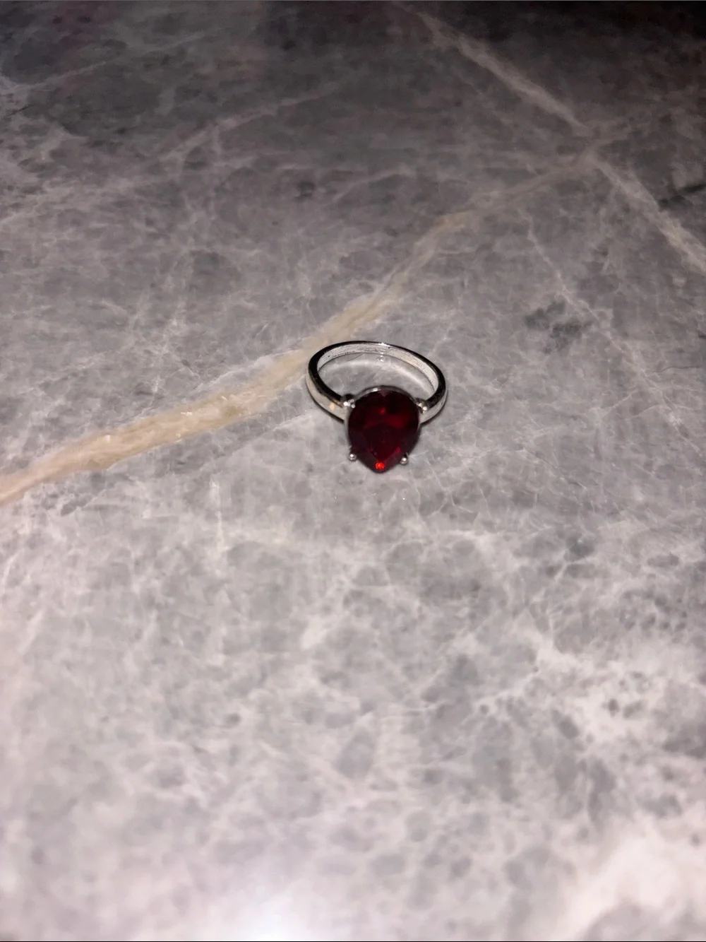 Silver Ring with Deep Red Teardrop Gemstone